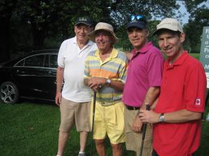 Quite the foursome: Sam Goldbloom, George and Glenn J. Nashen and Mike Cohen